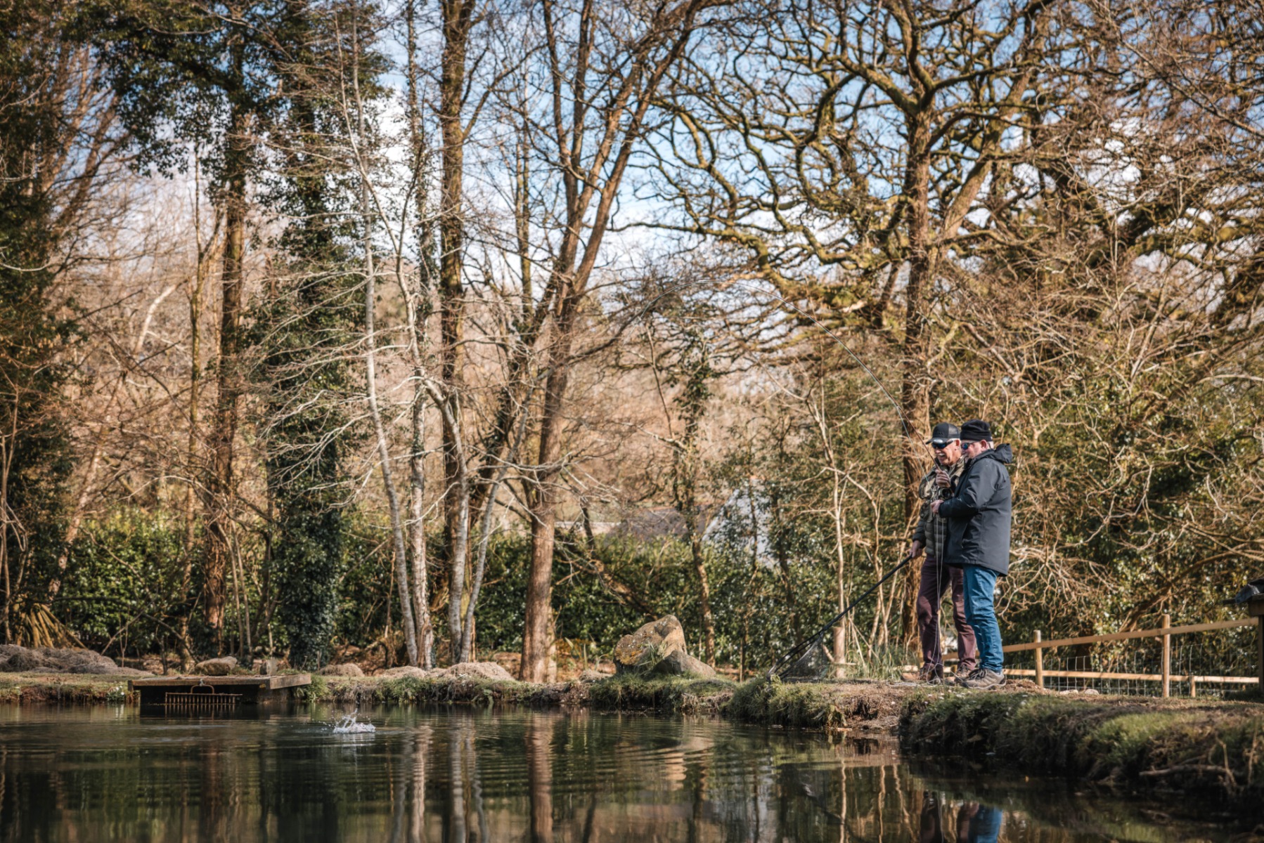 Simon Kidd offering advice on technique while conducting a beginners fly fishing lesson