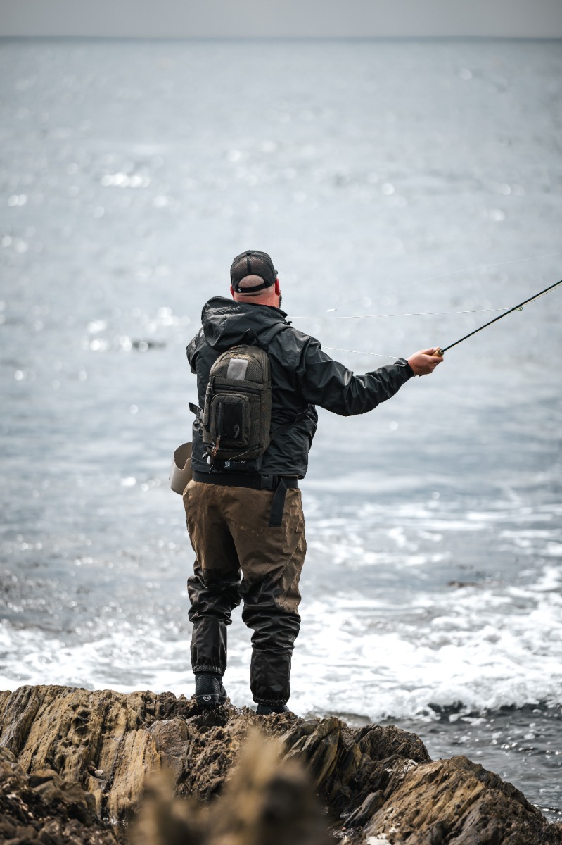 With his Snowbee Rockhopper boots providing a good grip Jon finds a stable rock top platform to cast off from
