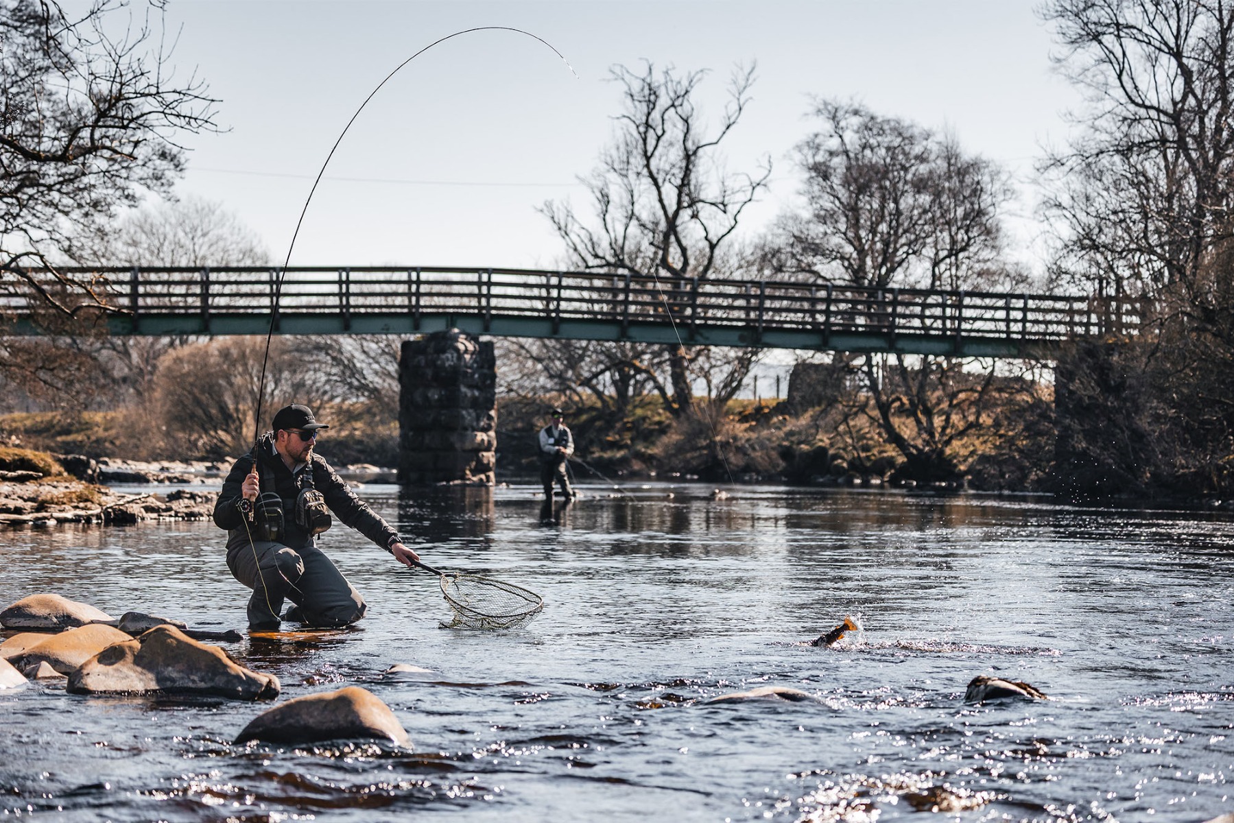 James Atkinson nets a trout on the river Tees